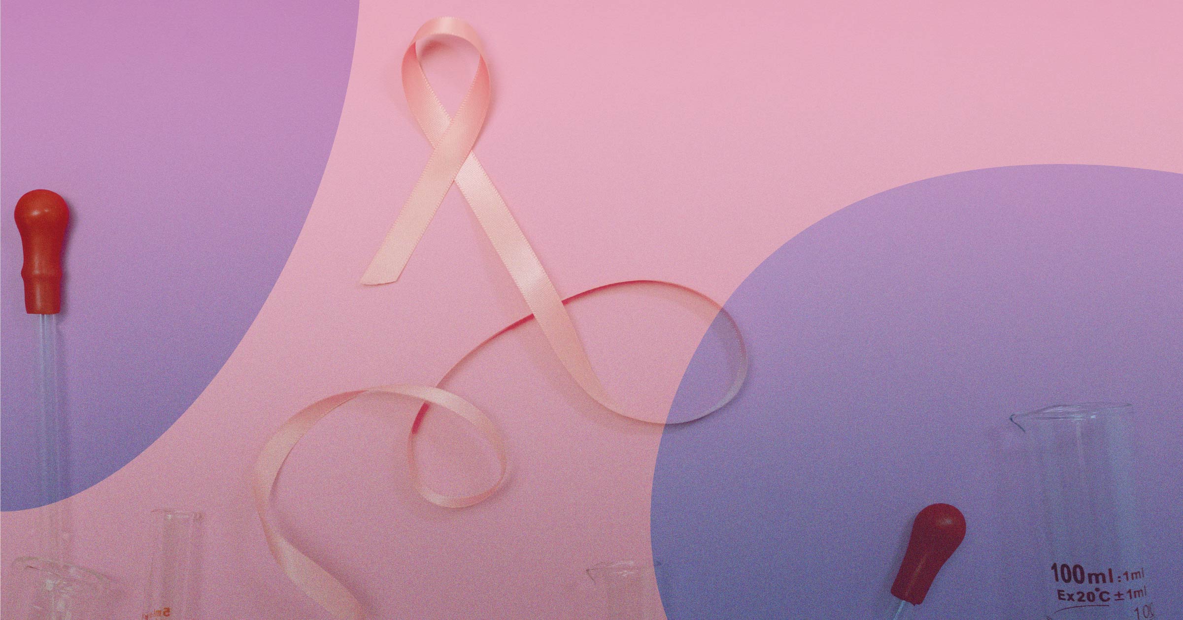 Breast Cancer ribbon surrounded by scientific equipment